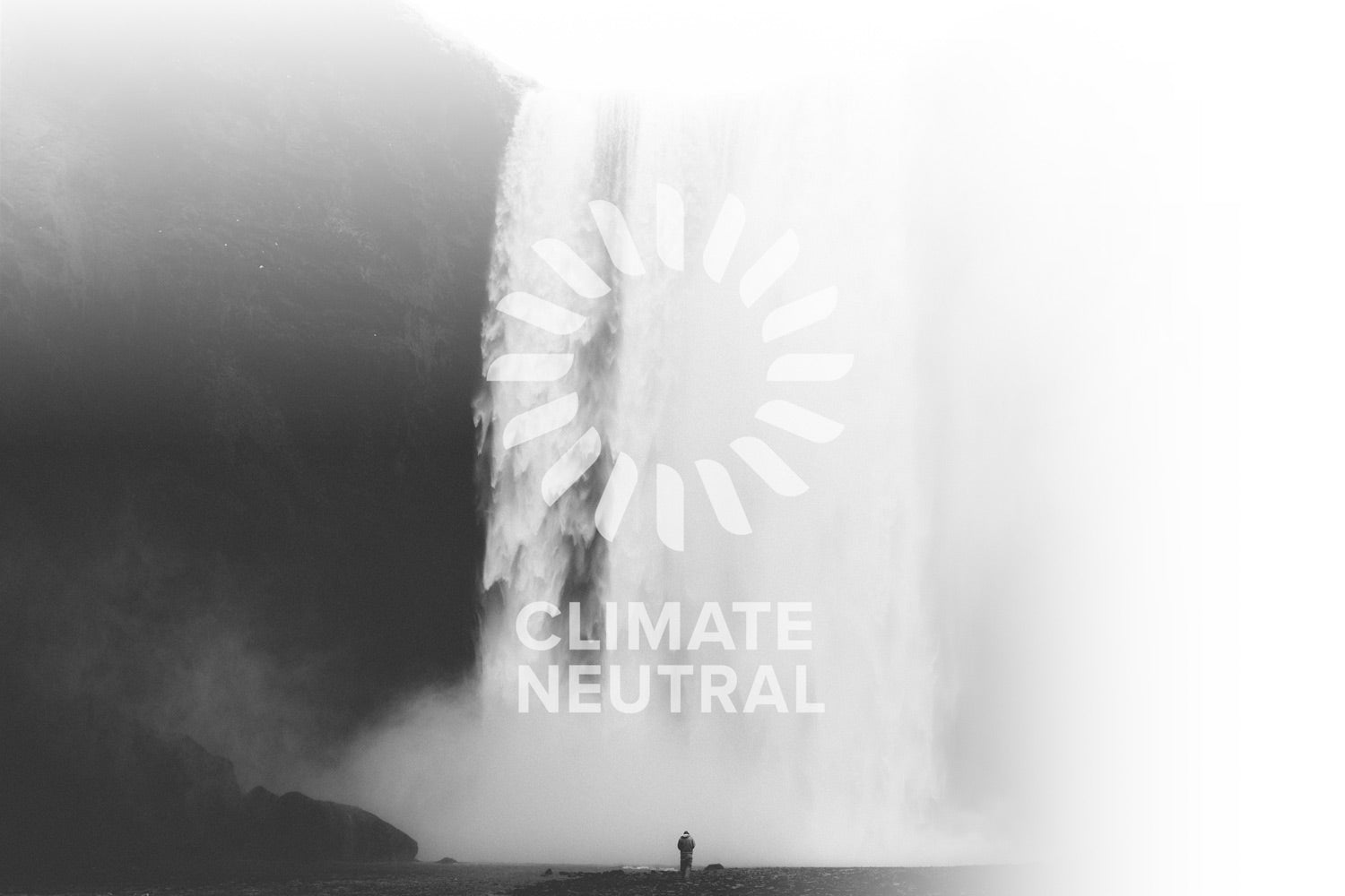 Climate Neutral Logo over black and white waterfall image