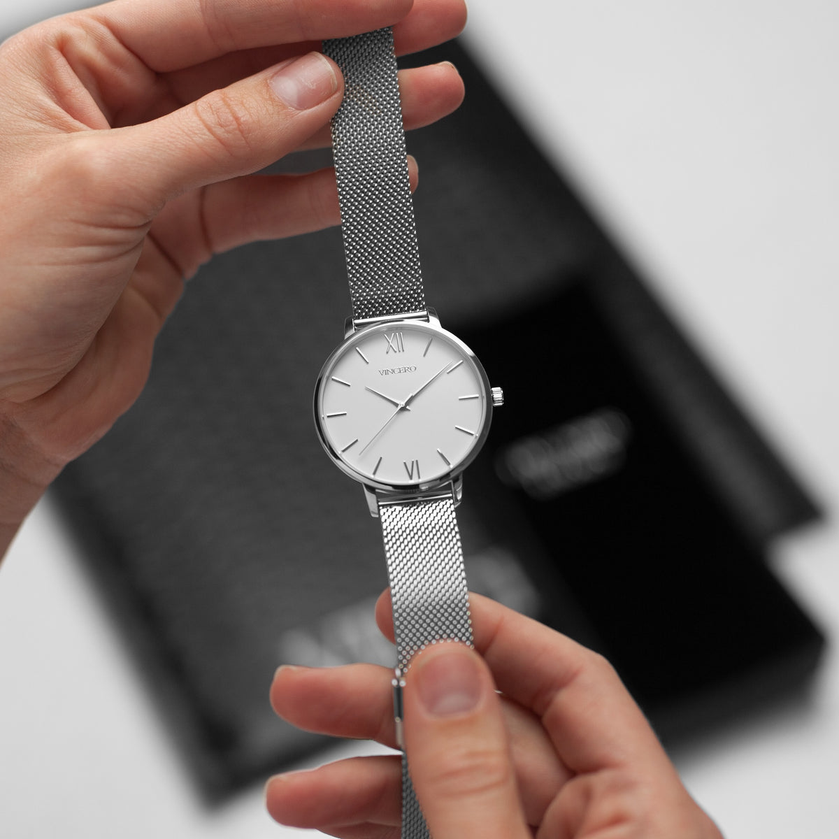 Eros Silver watch in hand