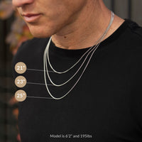 Man wearing a necklace with measurement labels on a black shirt