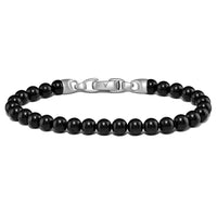 Black Tourmaline mens birthstone beaded bracelet with a silver clasp on a white background