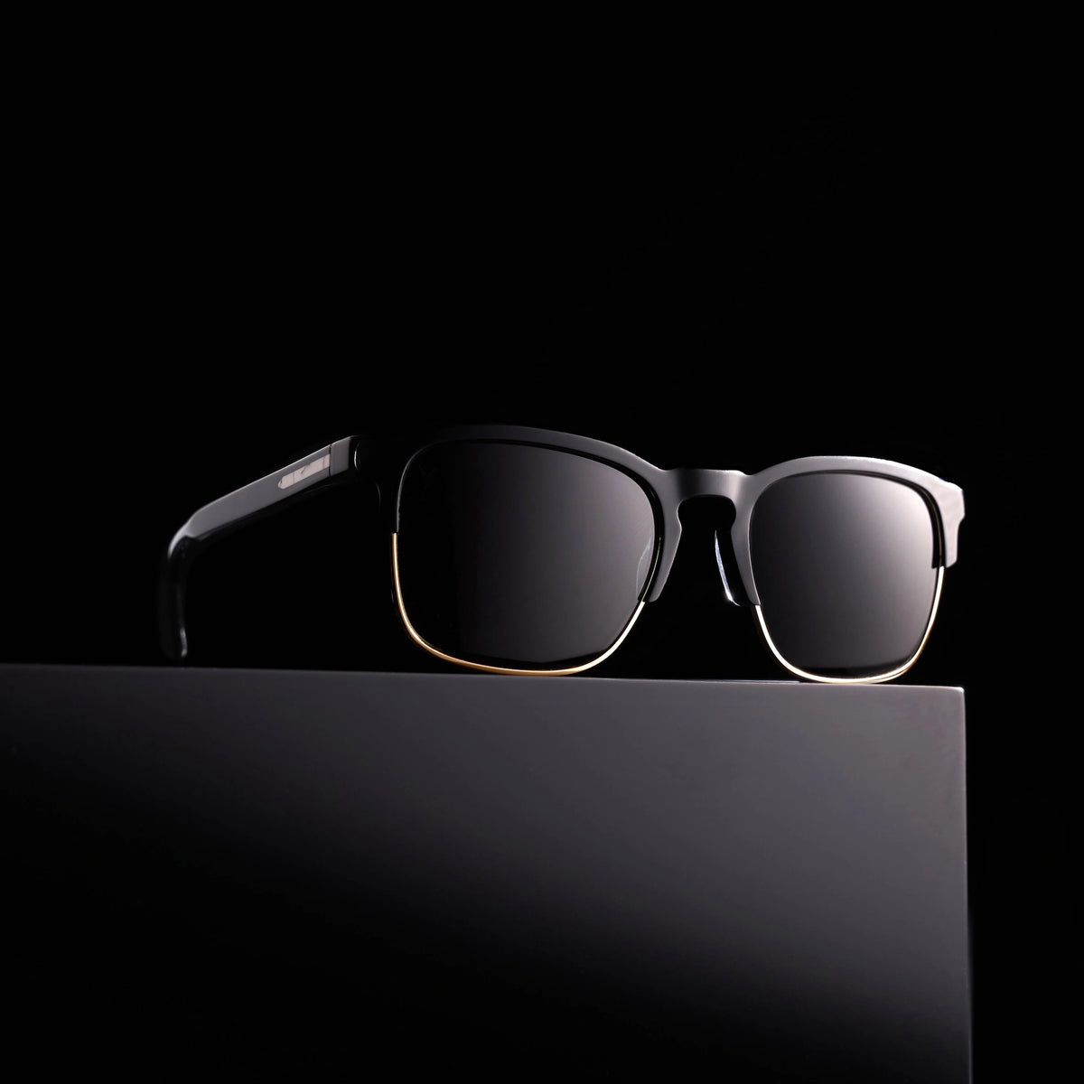 Black sunglasses on a black background