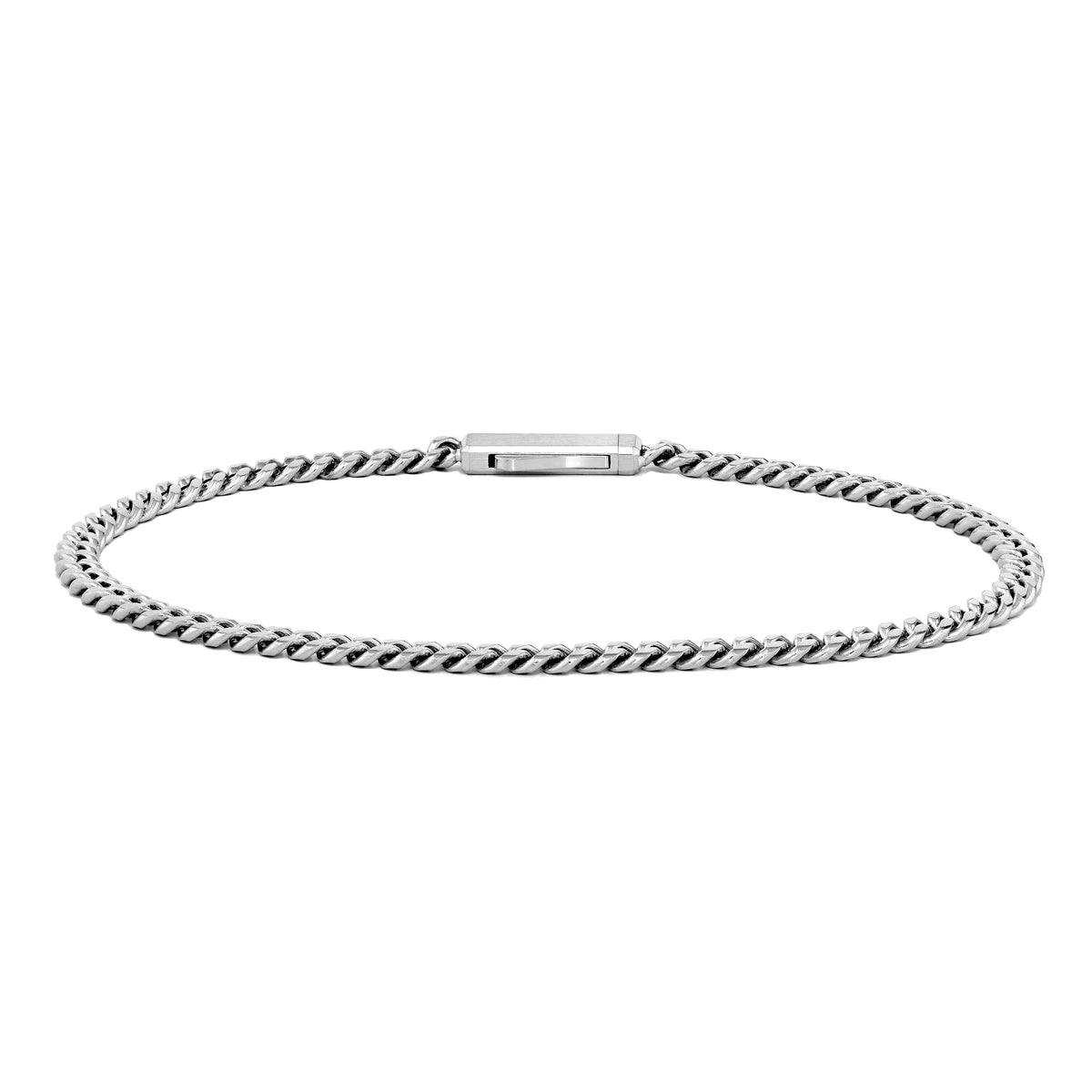 A silver-toned metal curb link chain bracelet with a rectangular clasp, shown against a plain white background.