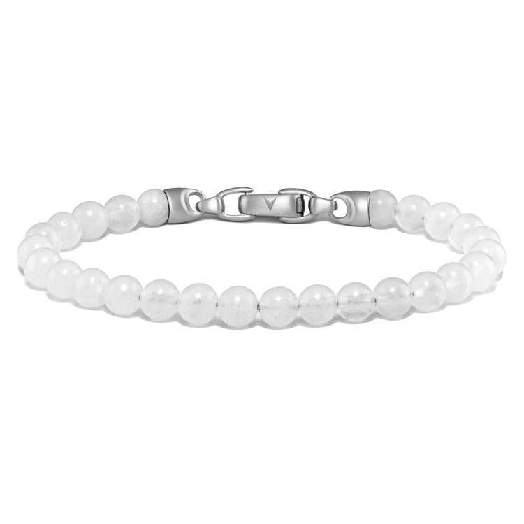 White beaded bracelet with silver clasp on a white background