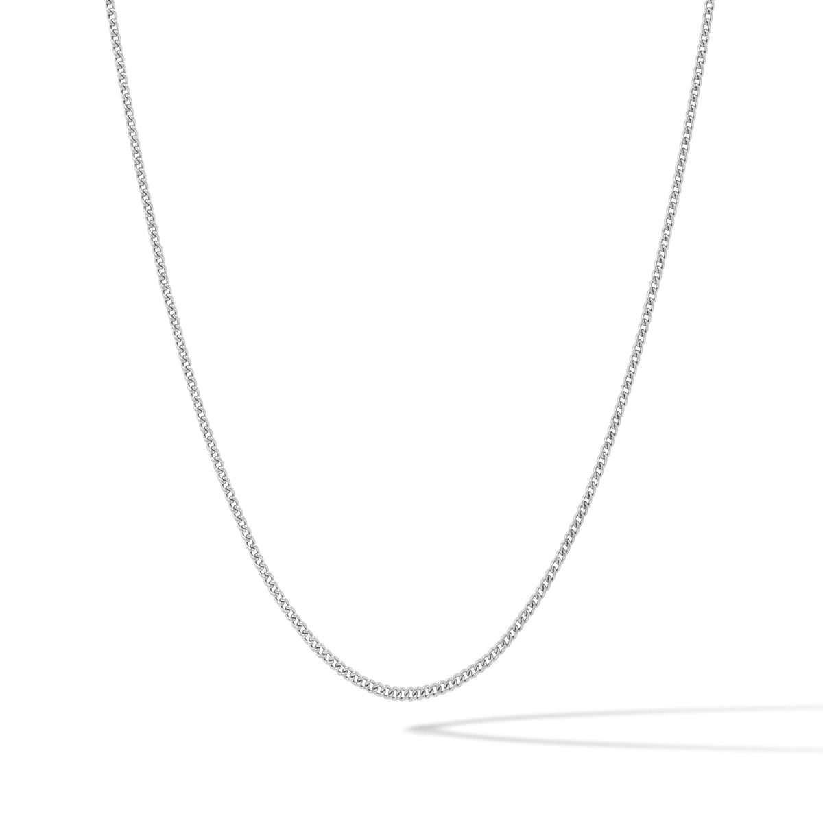 Silver chain necklace on a white background