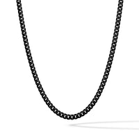 Black chain necklace on a white background