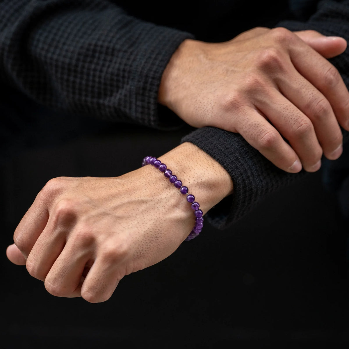 Amethyst bracelet on wrist

