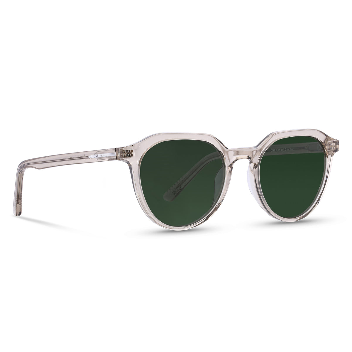 Sunglasses with green lenses and transparent frame on a white background
