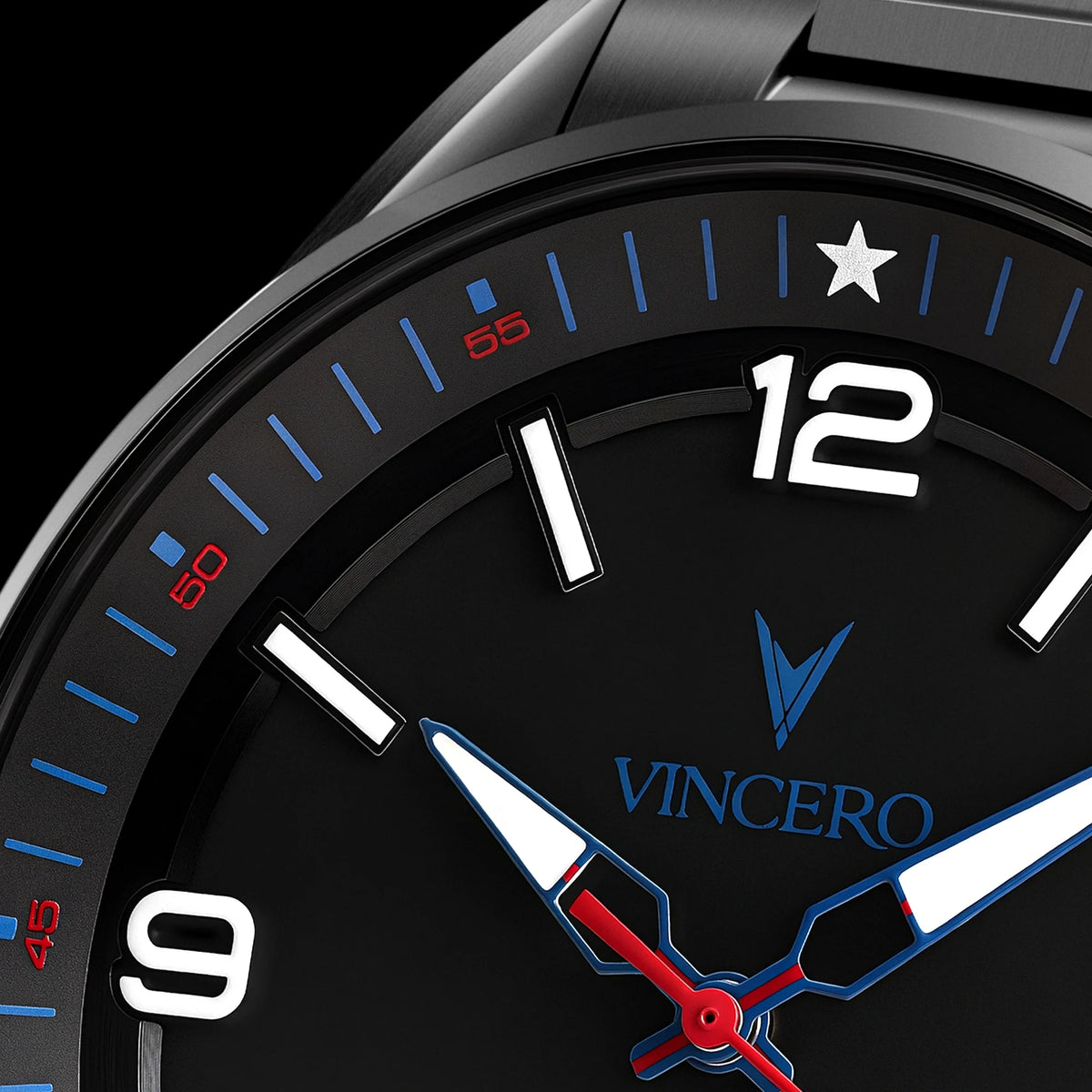 Close-up of a VINCERO watch dial and bezel, showing a black case, black dial with white numerals, blue minute markers and logo, and red hands.