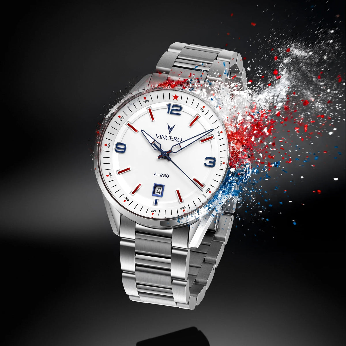 A silver stainless steel wristwatch with a white dial and red and blue accents, shown at an angle with a dramatic red, white, and blue particle explosion effect on a dark background.