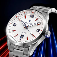 A silver stainless steel wristwatch with a white dial, featuring red and blue accents on the bezel and face, branded with the VINCERO name. The watch is shown at a dynamic angle against a dark background with red and blue light streaks.