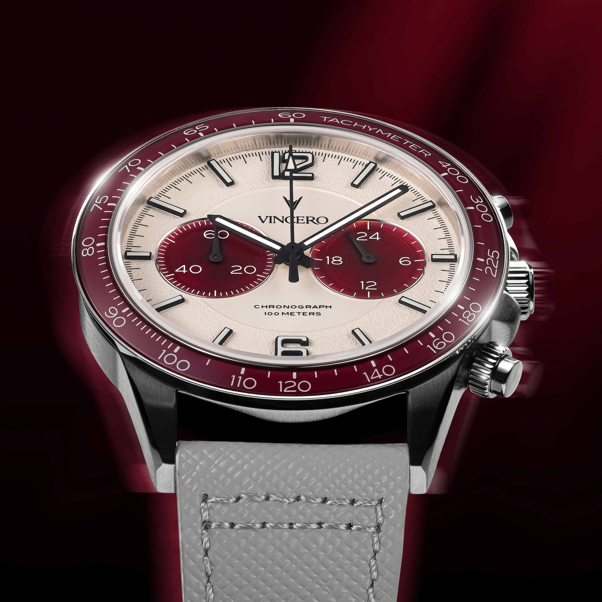 Watch with red and silver design on a dark background