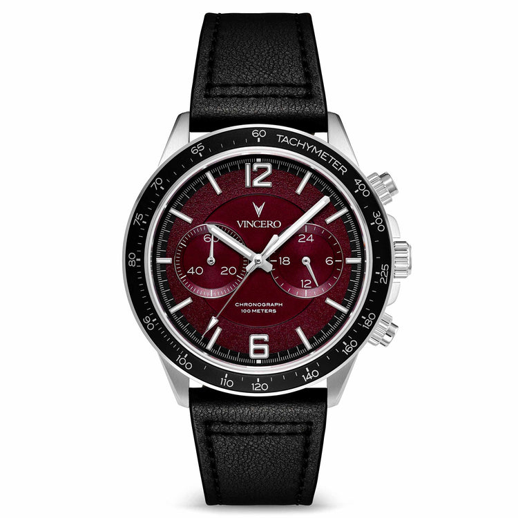A silver and black analog watch with a red dial and a leather strap, branded by VINCERO.