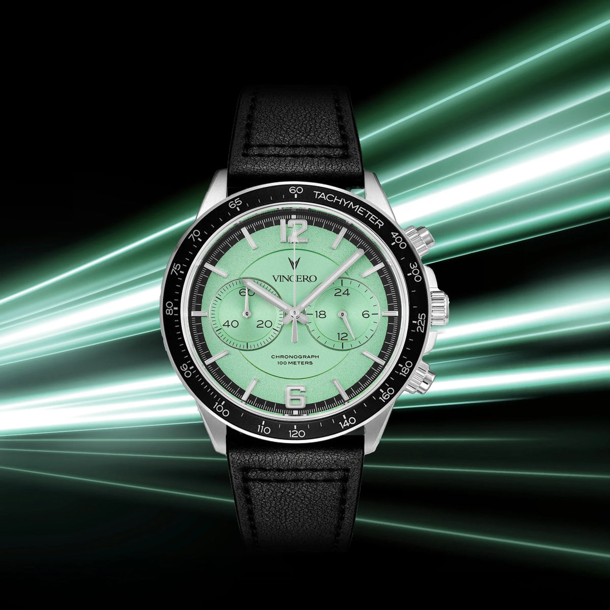 Watch with green face and black strap on a dynamic green and black background