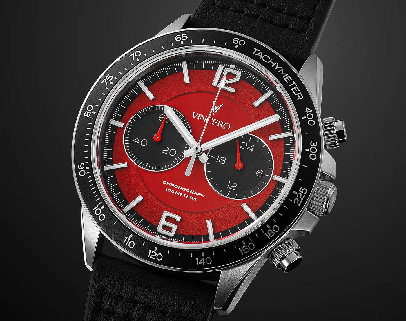 Close-up of the Apex Limited Edition watch, featuring a red face, black and silver casing, and black band.