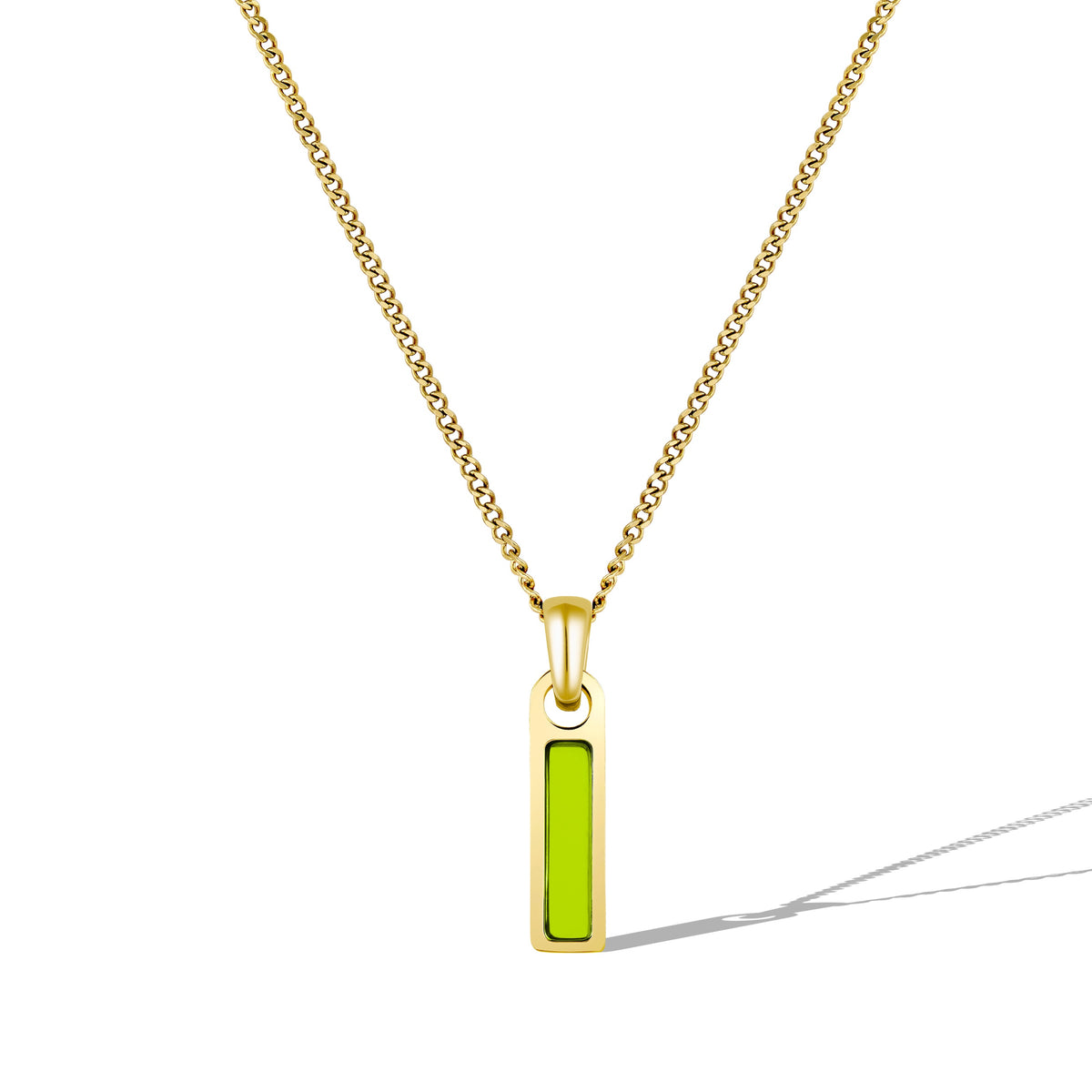 Gold necklace with a green pendant on a white background