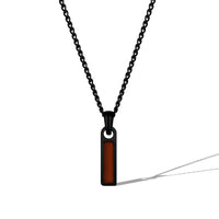 Black chain necklace with a rectangular pendant on a white background