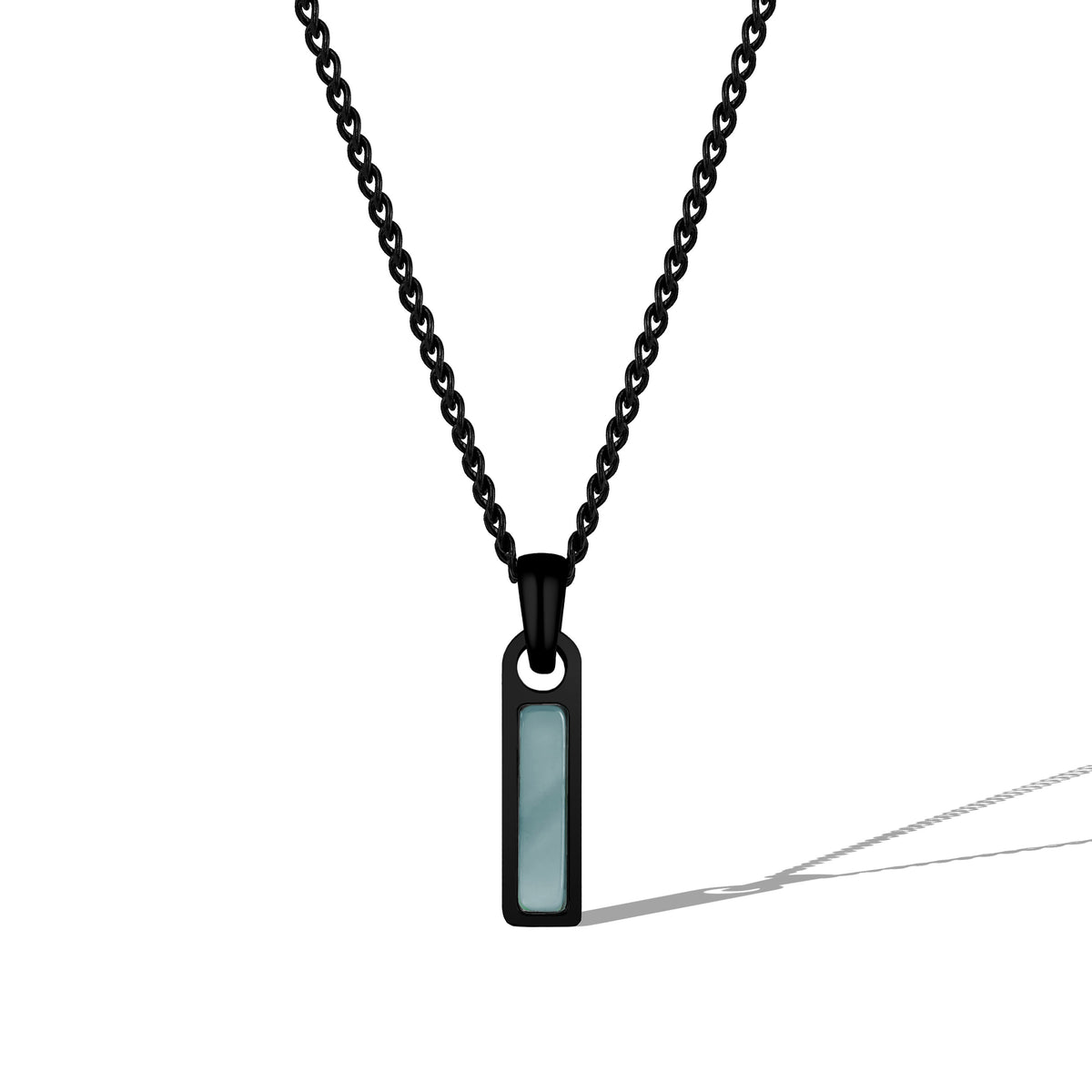 Black chain necklace with a rectangular pendant on a white background