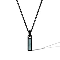 Black chain necklace with a rectangular pendant on a white background