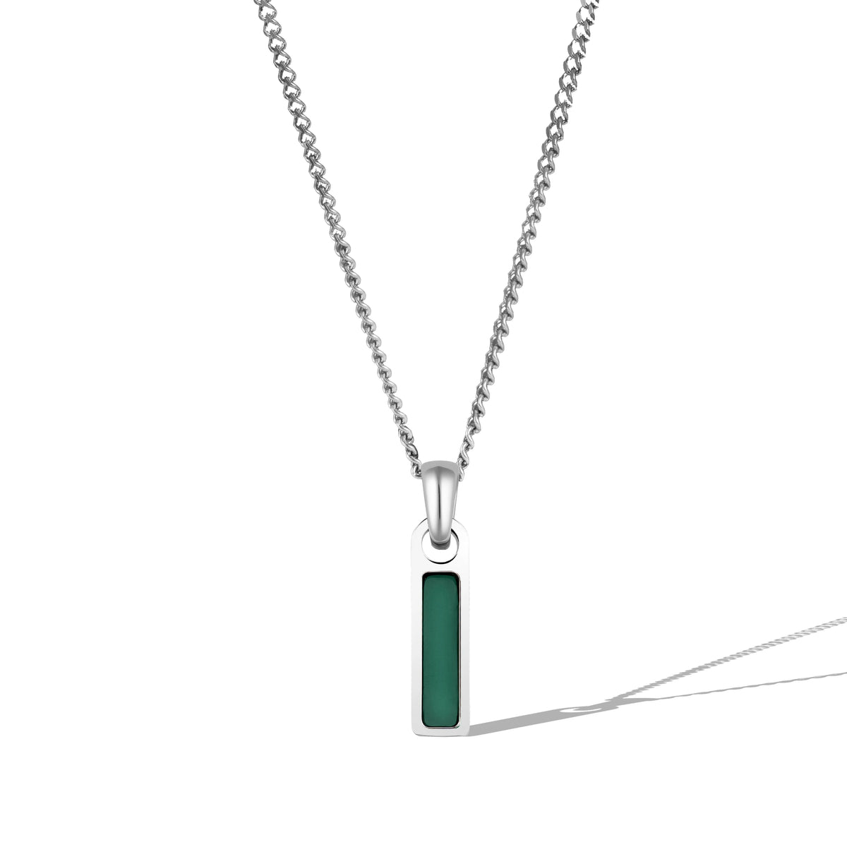 A silver necklace with a rectangular green tag pendant attached to a chain.