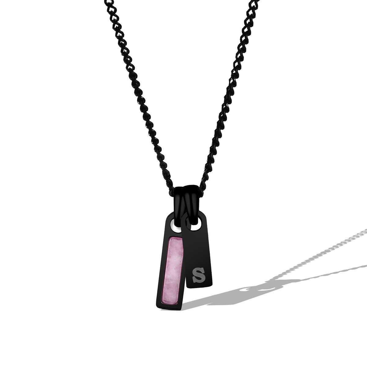 Black chain necklace with a pendant featuring a pink stone and 'S' initials on a white background