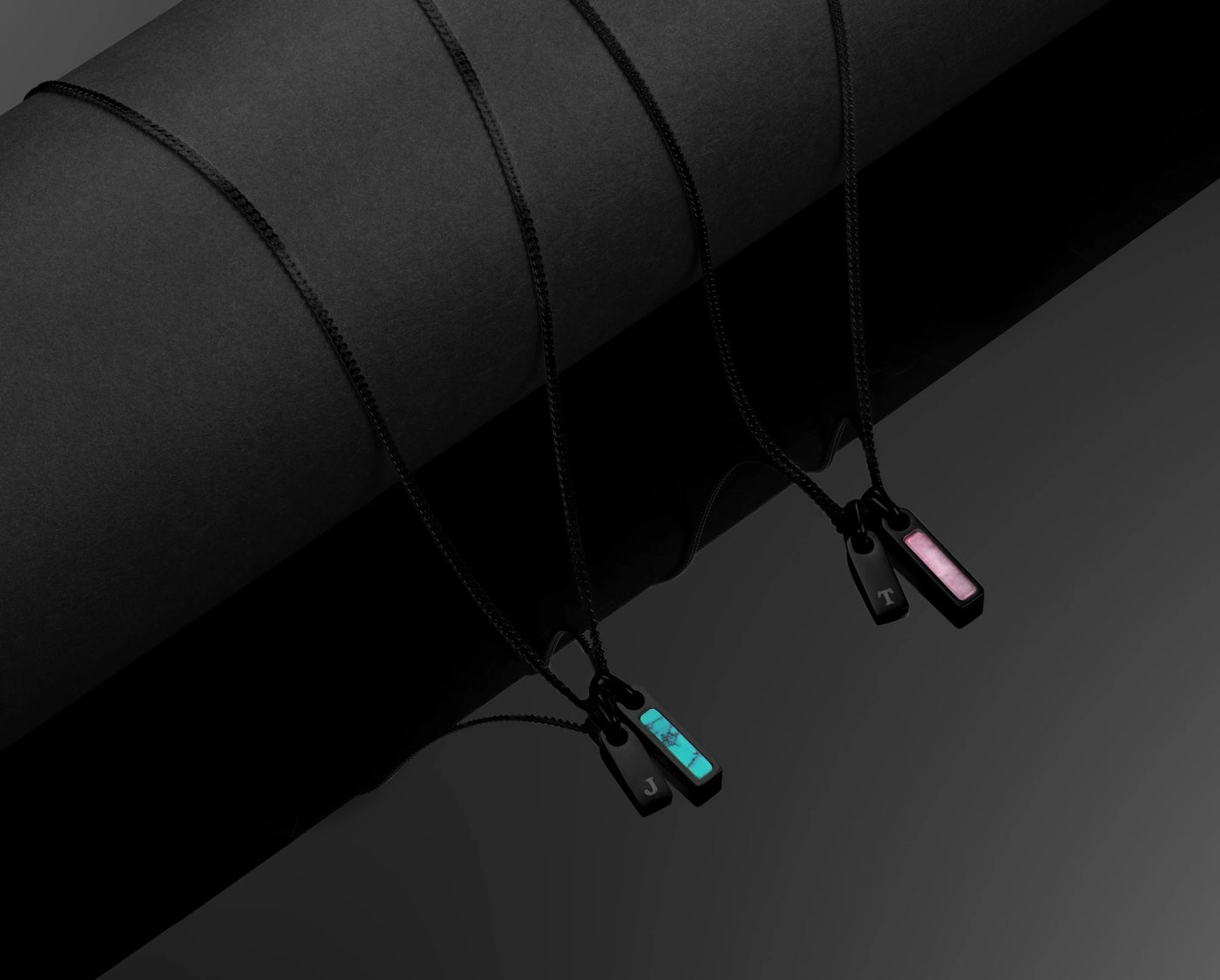Black umbrella with visible ribs and clips on a dark background