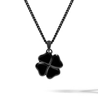 A black four-leaf clover pendant necklace on a matching black chain, shown against a clean white background with a soft shadow below.