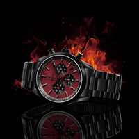 Black and red watch with flames on a black background