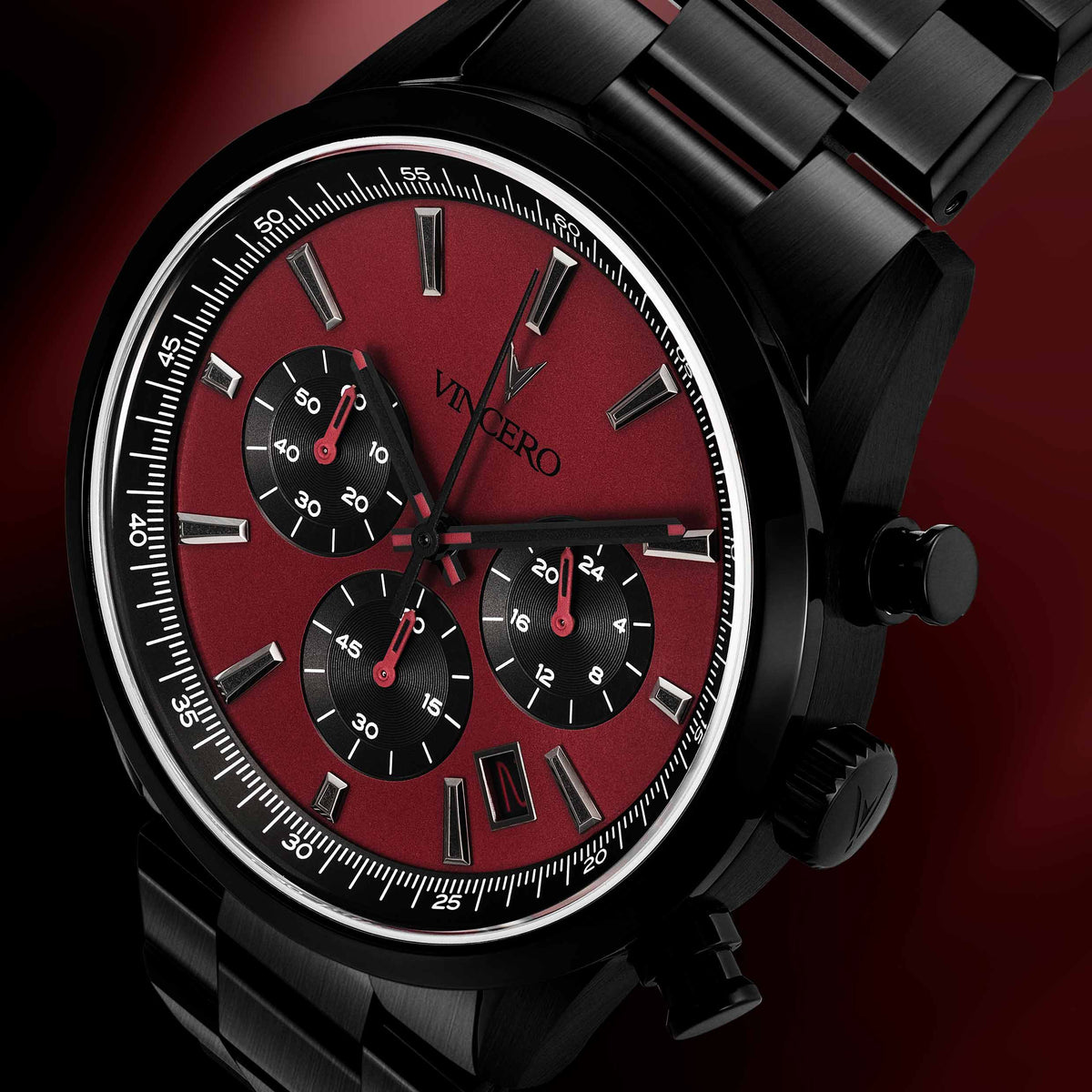 Black and red watch with 'Vincero' branding on a dark background