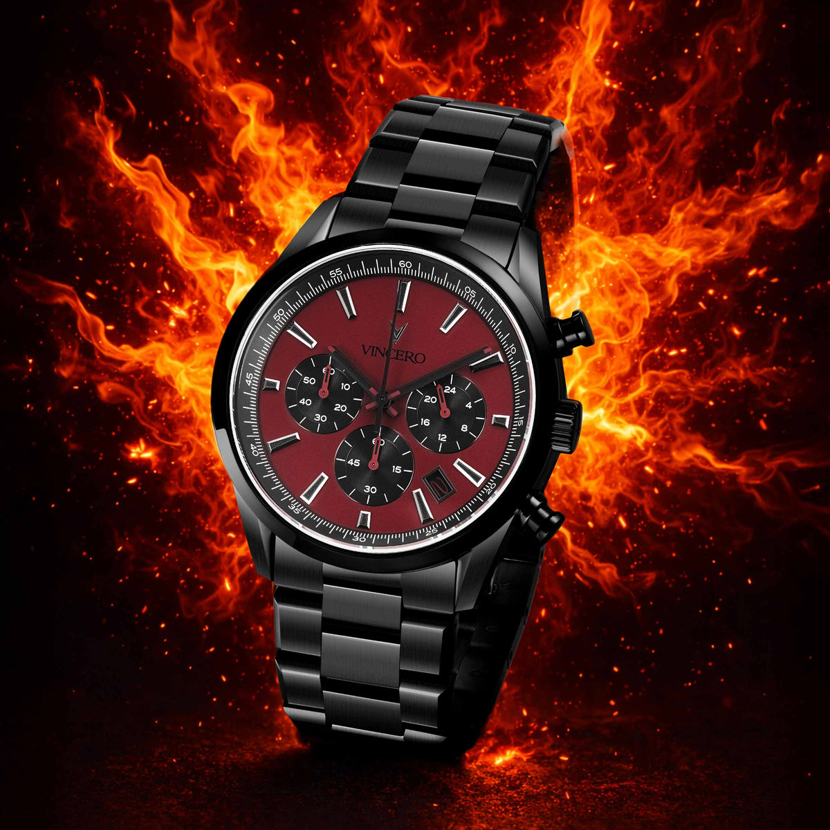 Black wristwatch with red face on a fiery background