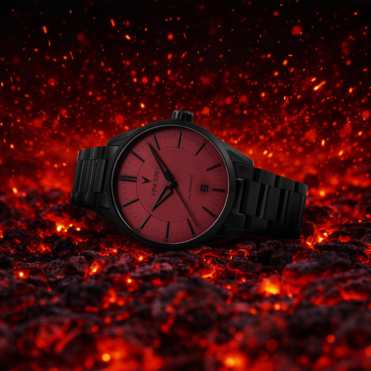 Black watch with red face on a fiery background