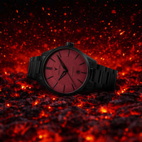 Black watch with red face on a fiery background