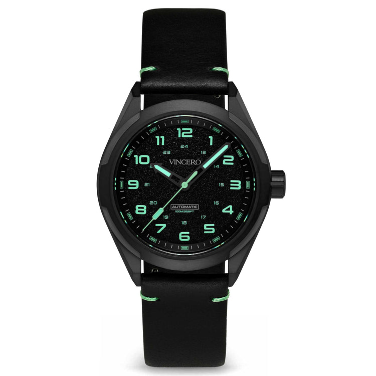 A black analog watch with a silicone band, digital display, and green luminous hands.