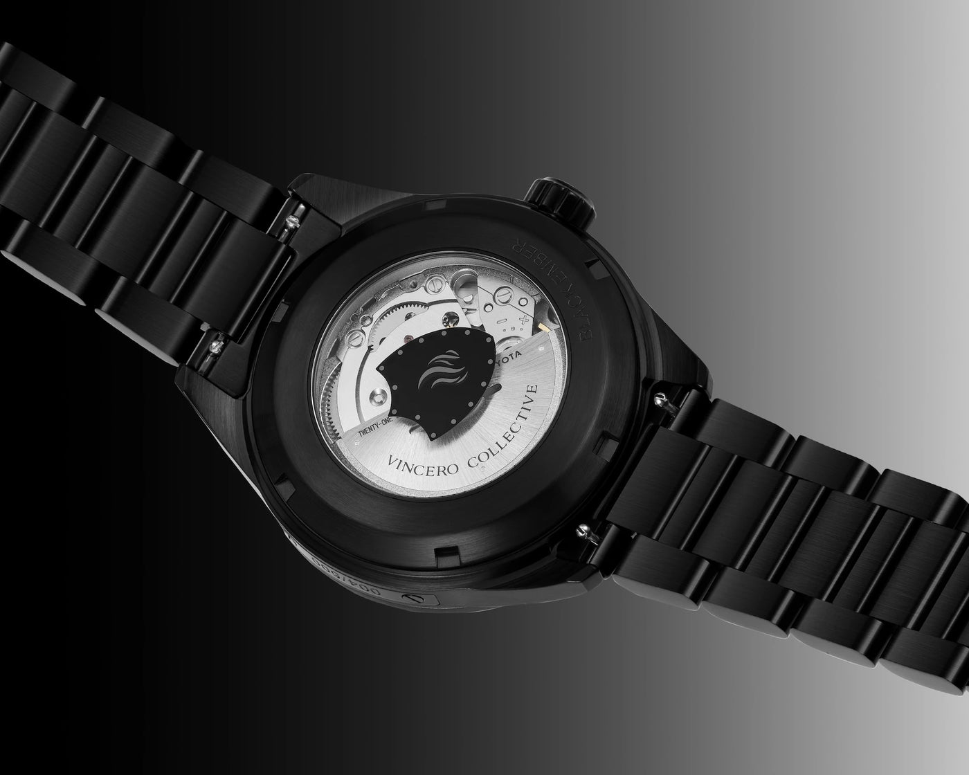 Black watch with visible brand logo on a gradient background