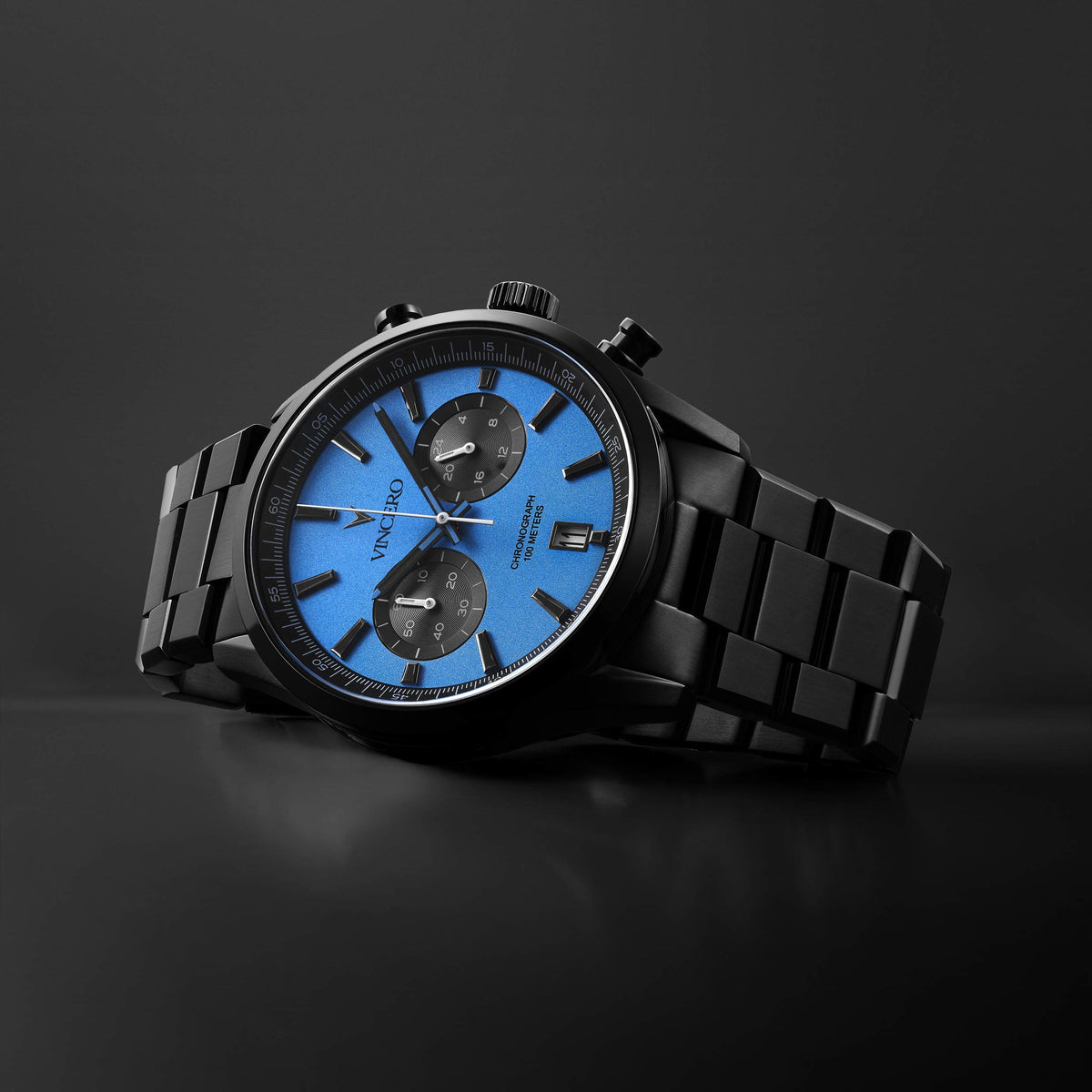 Low-angle image of the Chrono Limited Release watch, featuring a blue face and matte black band.