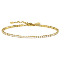 Gold bracelet with clear stones on a white background