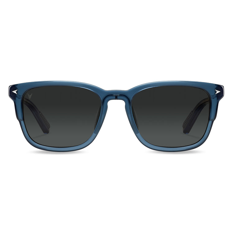 Blue sunglasses with dark lenses on a white background