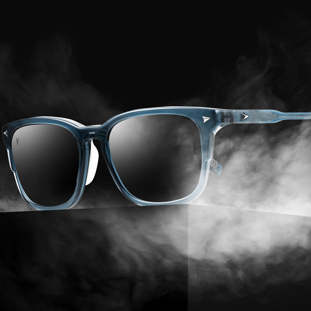 Blue sunglasses with a dark background