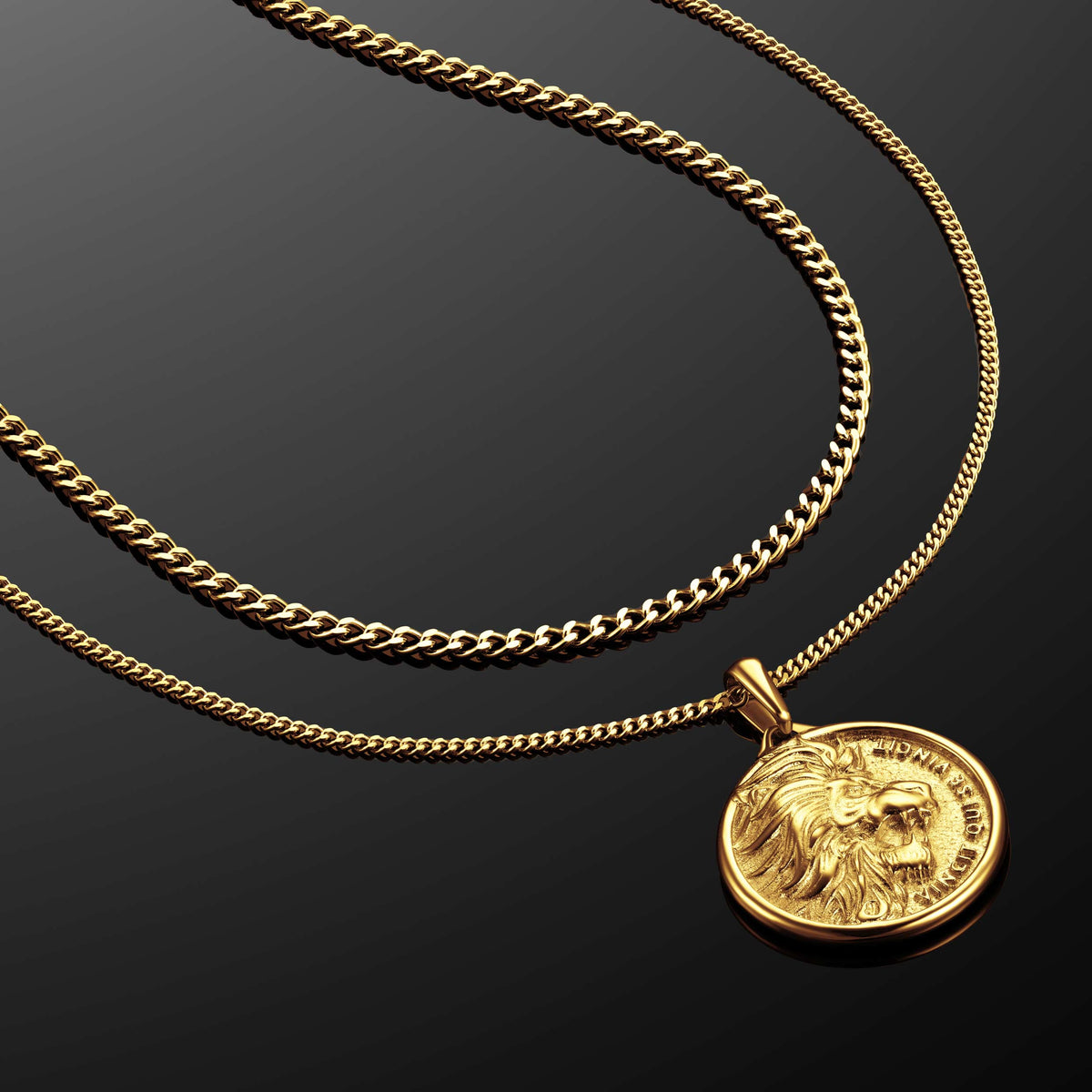 Gold chain necklace with a lion head pendant on a black background