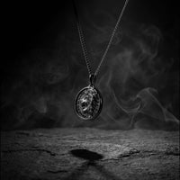 Black lion pendant for men with smoky background 