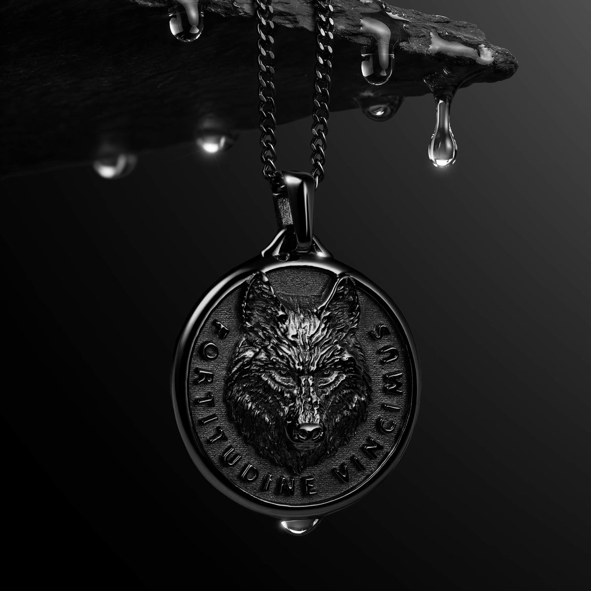 Black wolf pendant for men hanging from rock 