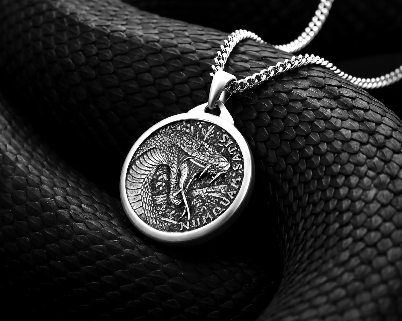 Men's black viper sterling silver pennant on a snake 