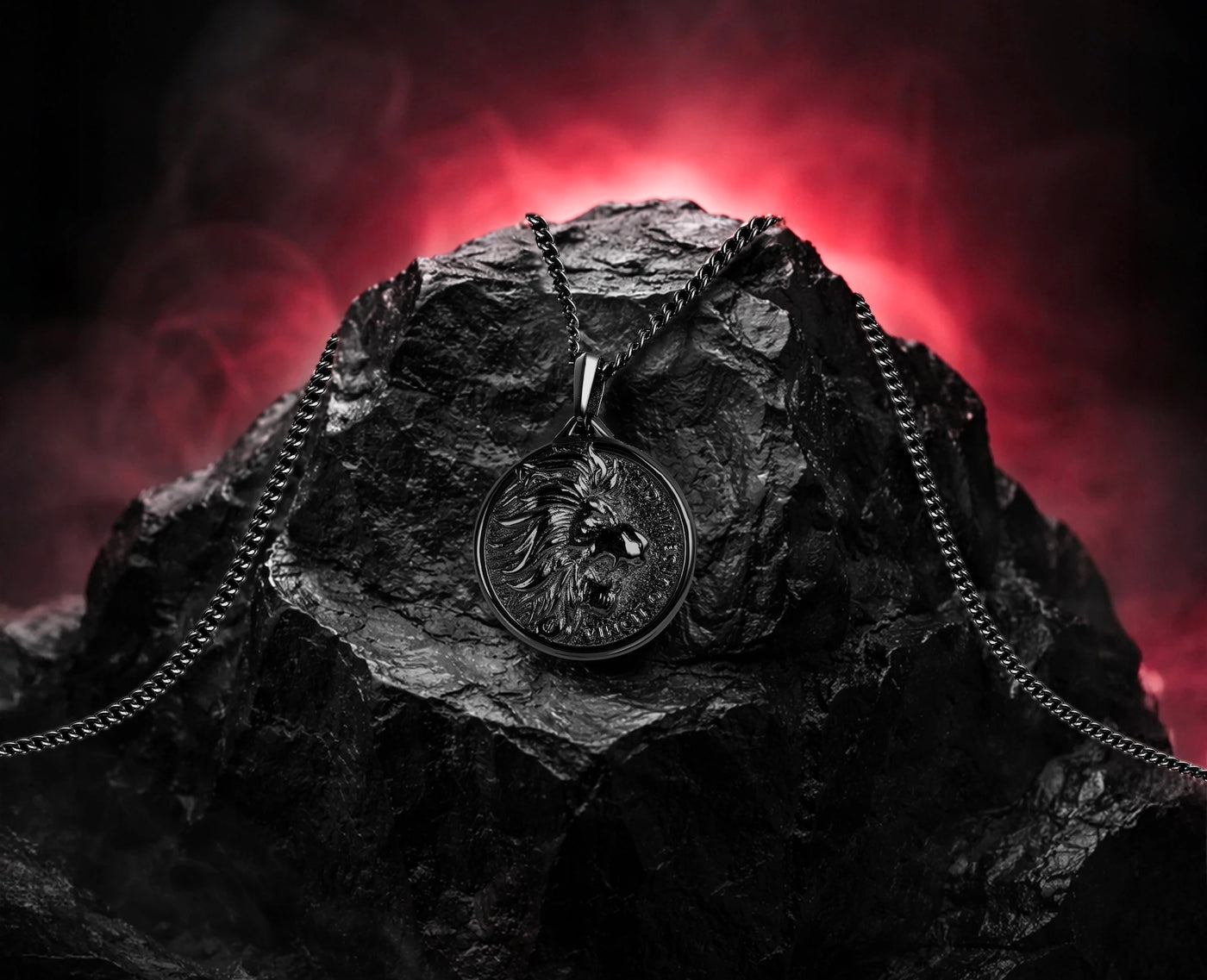 Wolf pendant necklace on a dark stone with a red smoky background