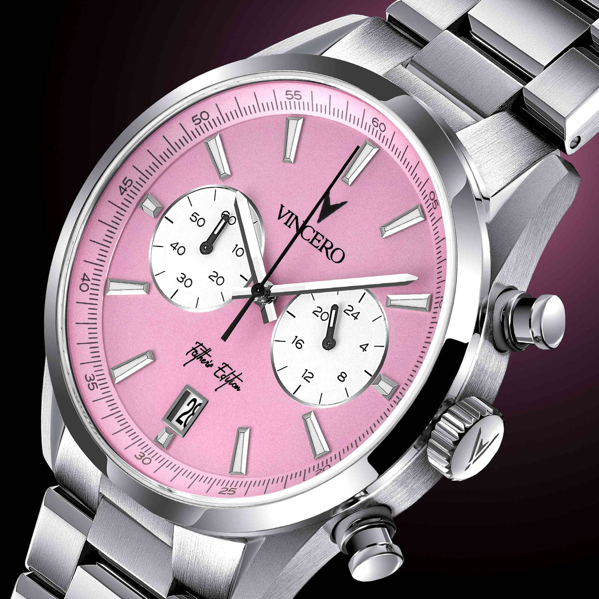 Close-up of the Father’s Edition watch, featuring a pink face, stainless steel casing, and steel band.