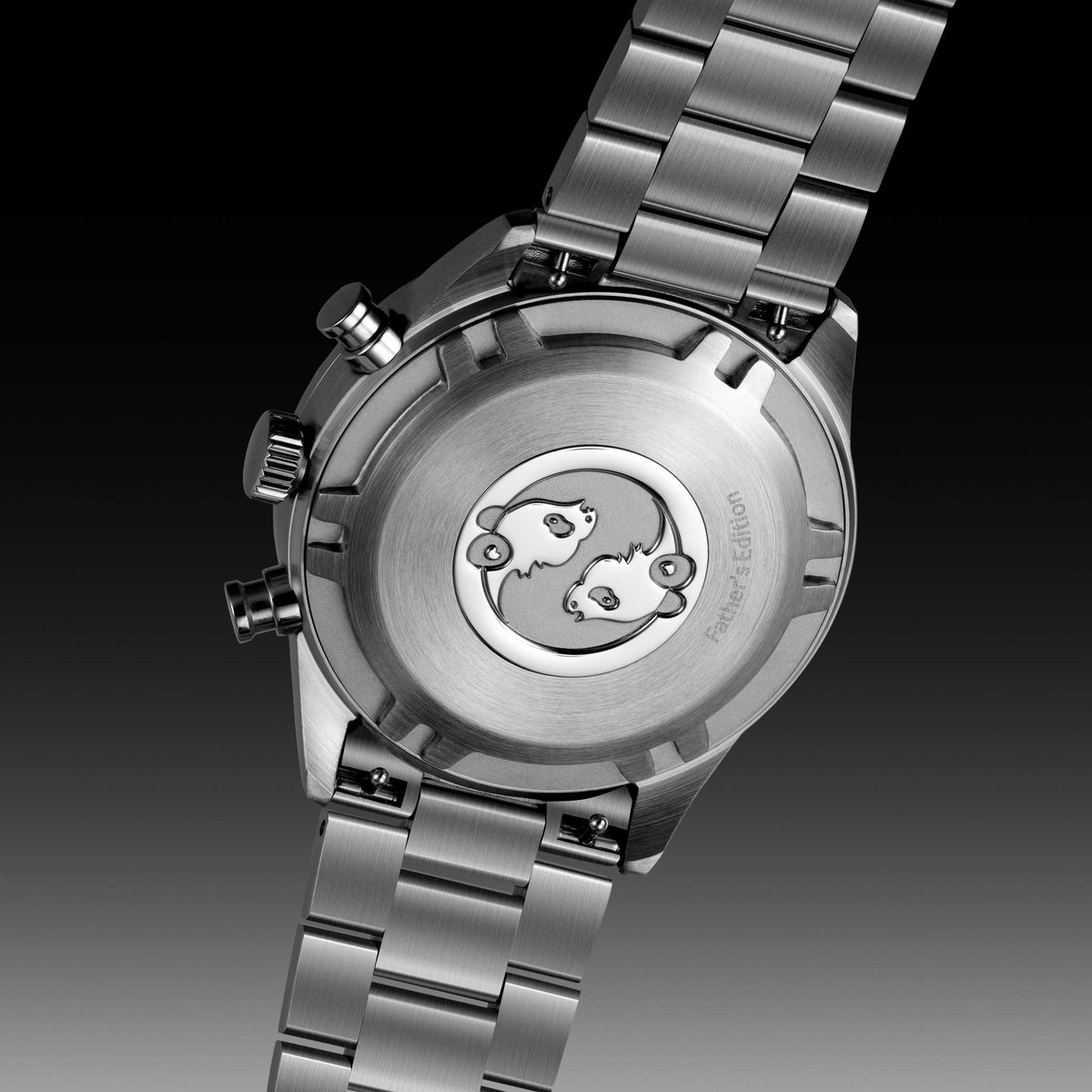 Stainless steel watch with "Father's Edition" engraved on the back, near an emblem of panda bears.