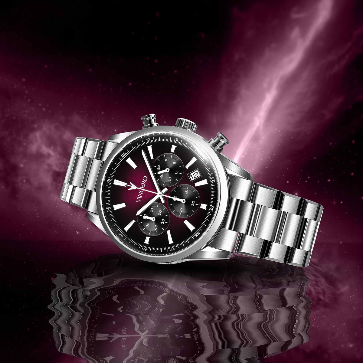 Silver wristwatch with a black face on a reflective purple surface