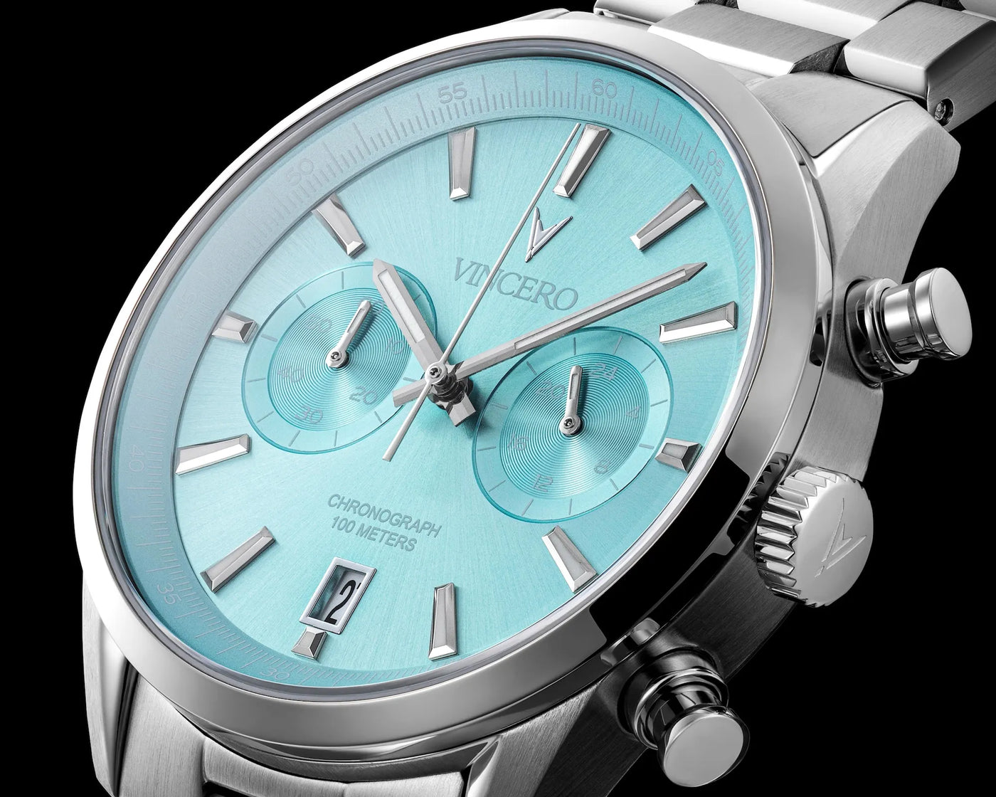 Close-up of the Chrono Limited Release watch, featuring a Carolina blue face, stainless steel casing, and steel band.
