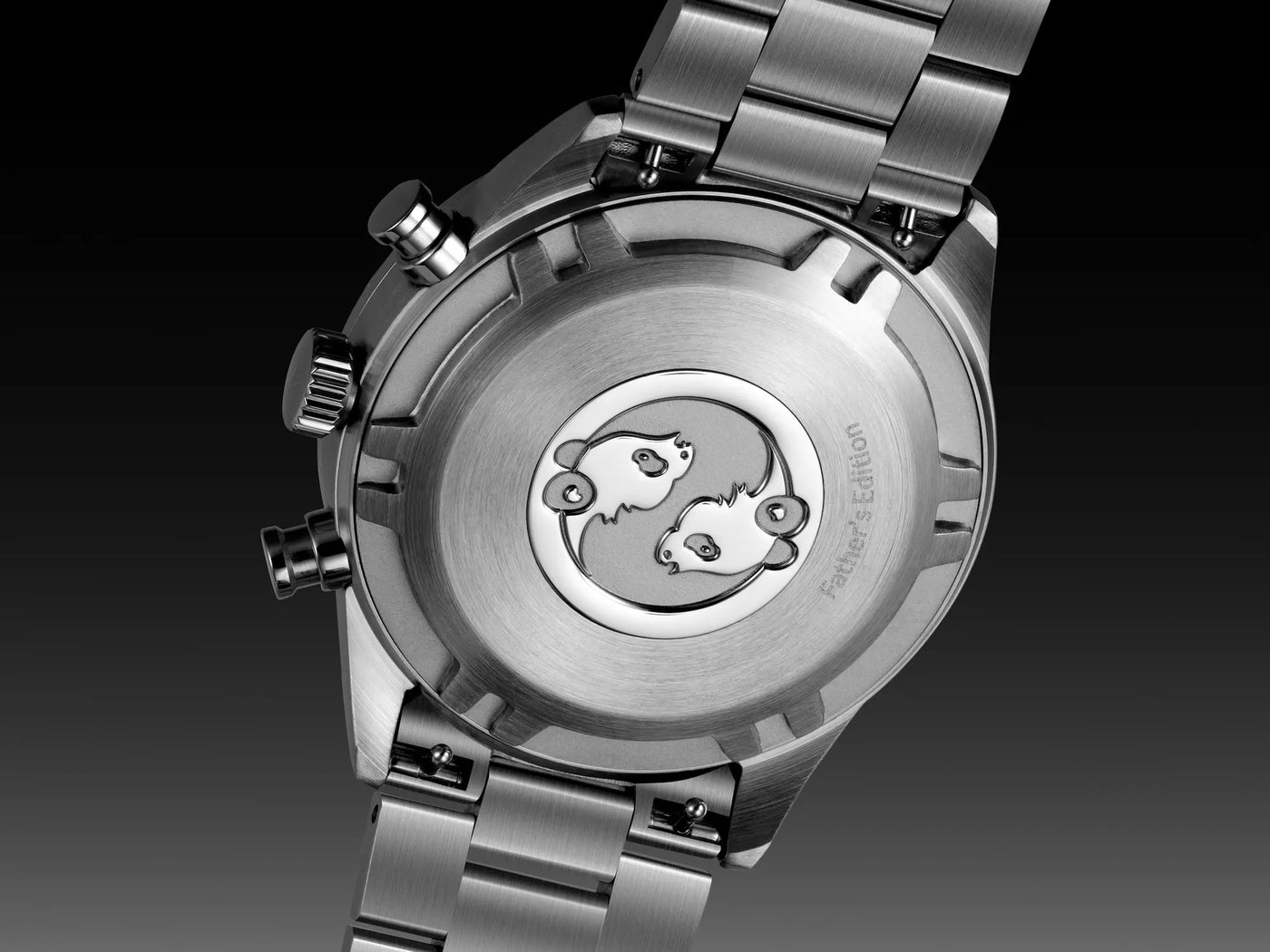 Stainless steel watch with "Father's Edition" engraved on the back, near an emblem of panda bears.