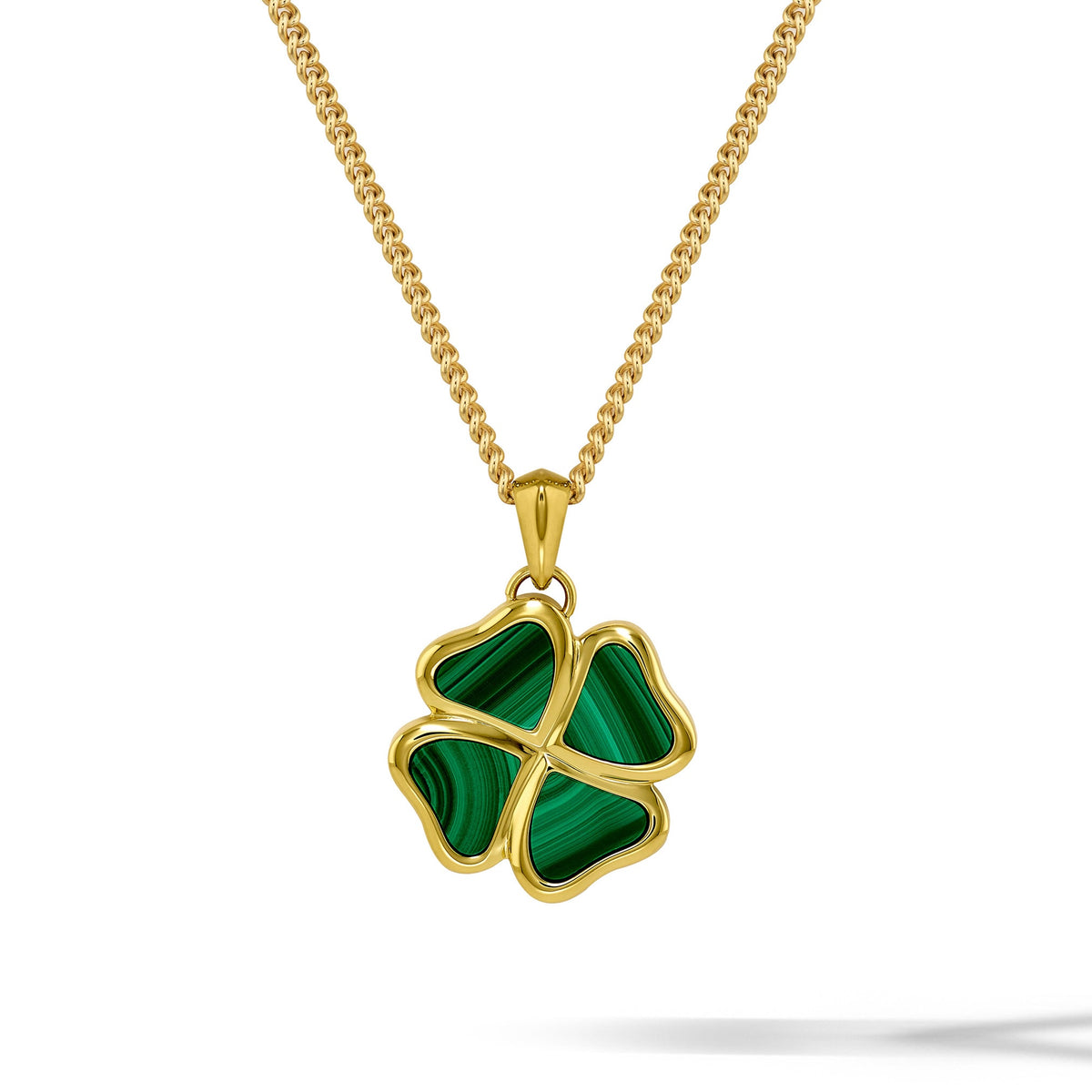 A gold chain necklace with a four-leaf clover pendant featuring green malachite inlay, shown on a clean white background.