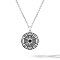 Silver compass pendant necklace on a white background