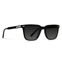 Black sunglasses with dark lenses on a white background